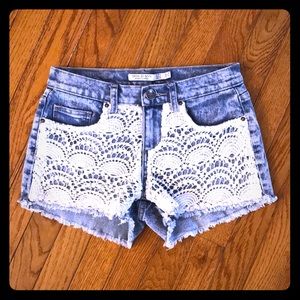 IRIS JEANS Distressed Denim Lace Jean Shorts